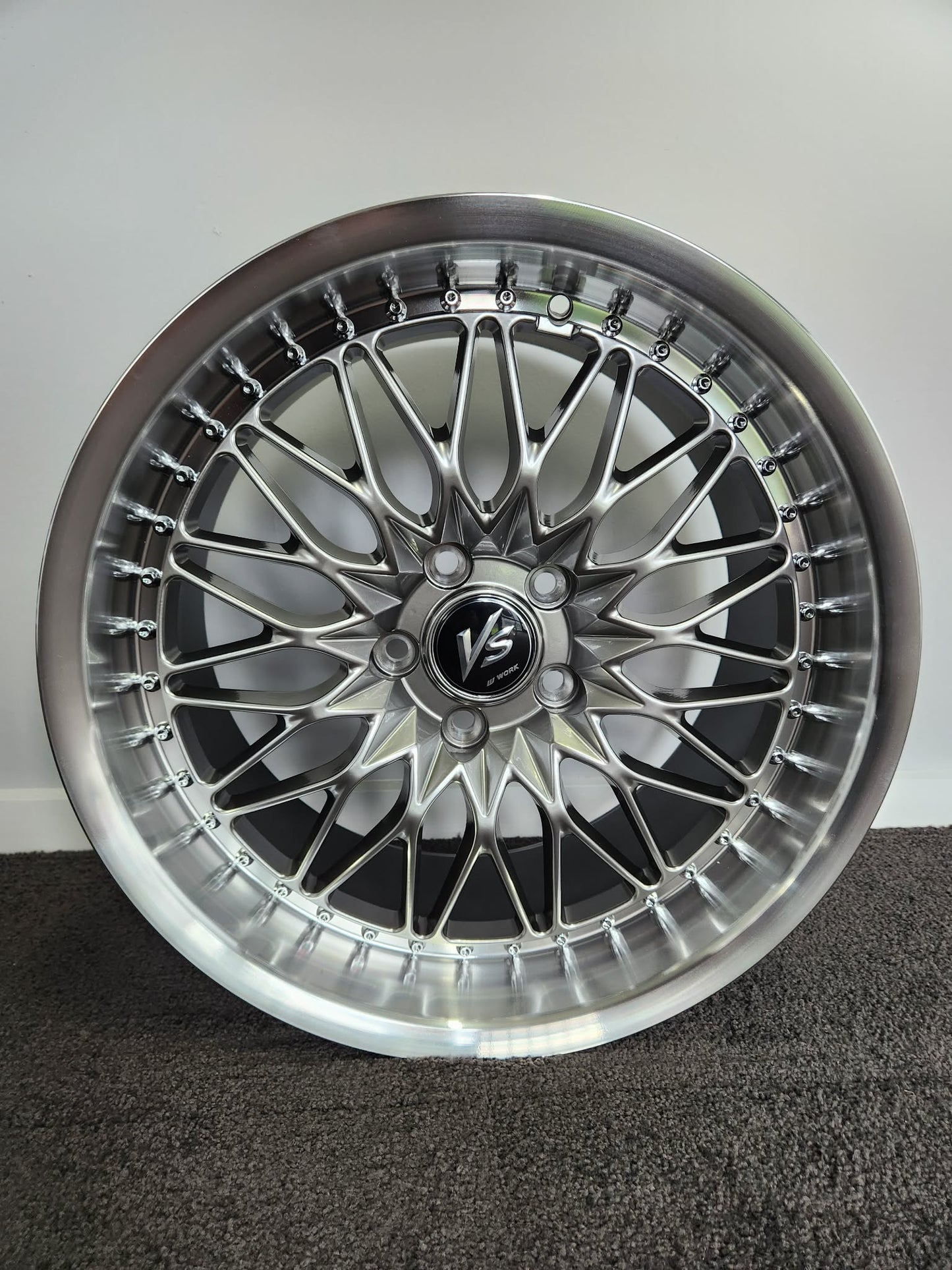 Work VS JDM style silver mesh wheel rim showroom view