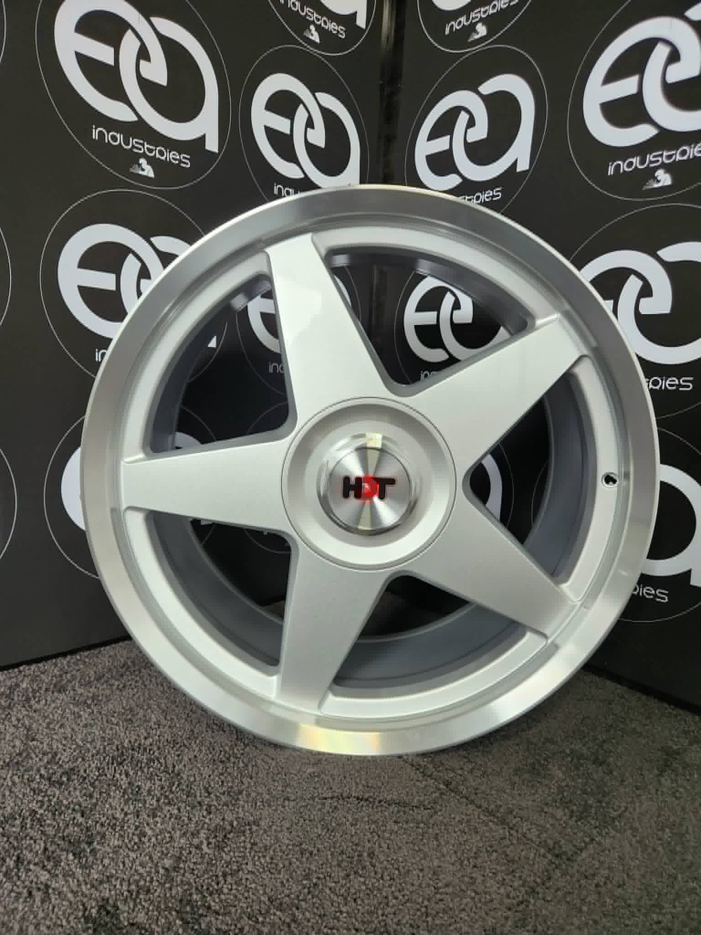 Holden HDT Stars style silver five spoke wheel rim showroom view
