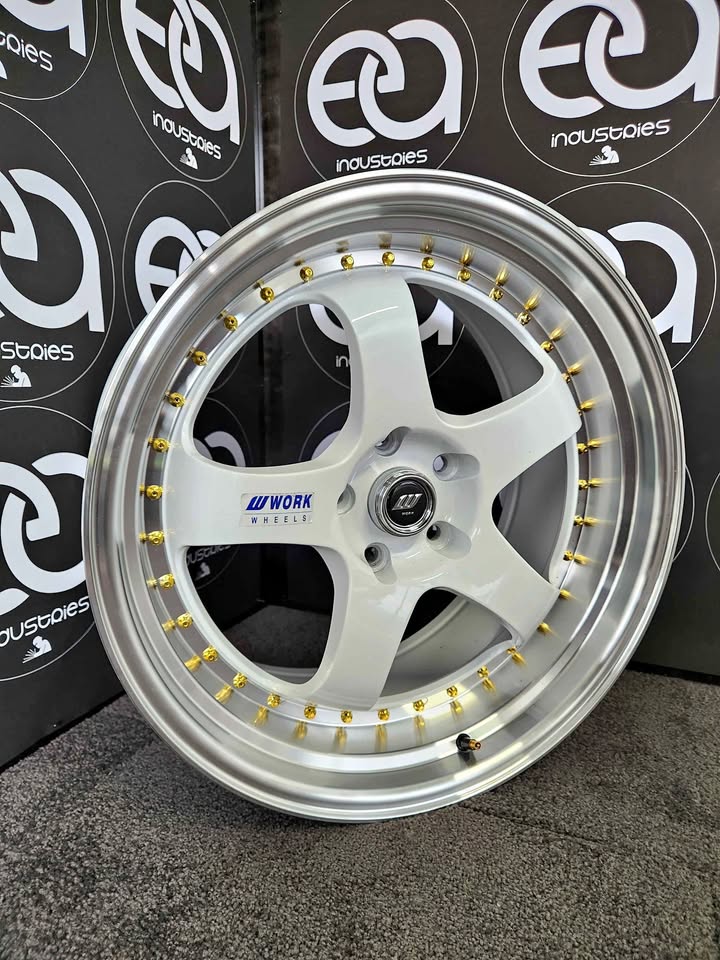 Work Emotion style white wheel with machined lip showroom view